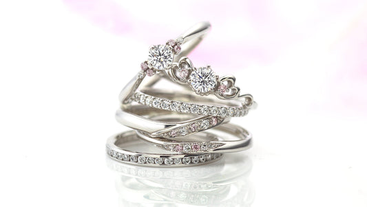 Image of milk and strawberry wedding and engagement rings. Pink diamond rings symbolizing eternal love and lasting happiness.