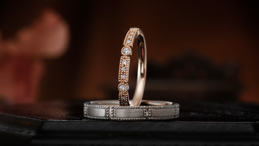 A time shared by two, connected by dots. Milgrain-design wedding rings.
