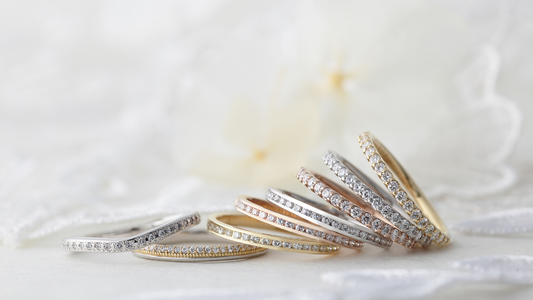 A half eternity ring makes a great choice for an engagement ring! Pair it with your wedding band for a sophisticated, elegant look.