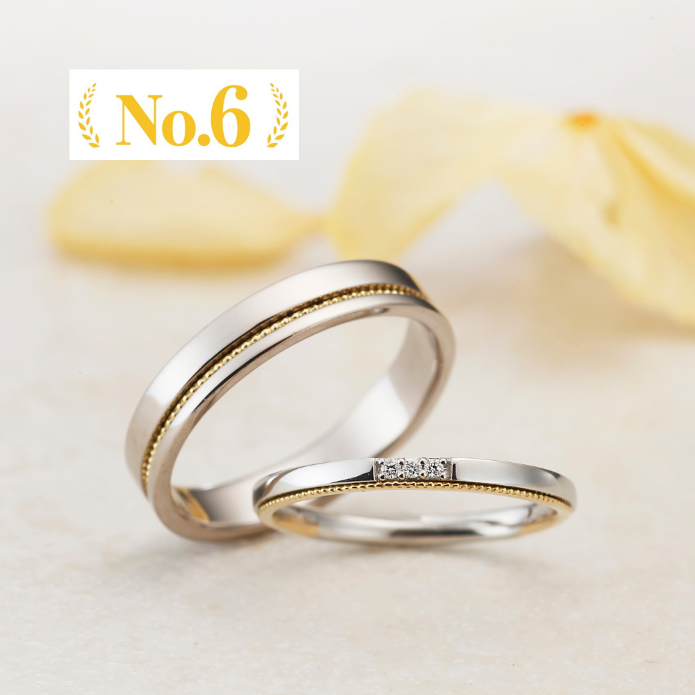"antique wedding t ring from the Aglobe japan Amour Amulet collection.
Combination marriage ring（wedding ring,wedding band） in platinum and K18 pink gold（K18 Yellow Gold）.
Rings with milling"