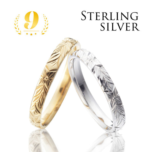 Hawaiian gold wedding band with OHANA engraving and vintage finish.