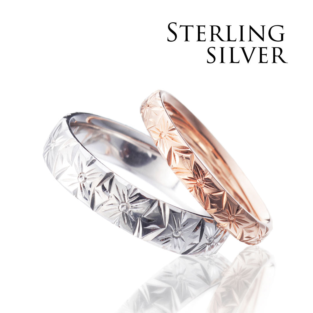 Hawaiian gold wedding band with PLUMERIA BOUQUET engraving finish.