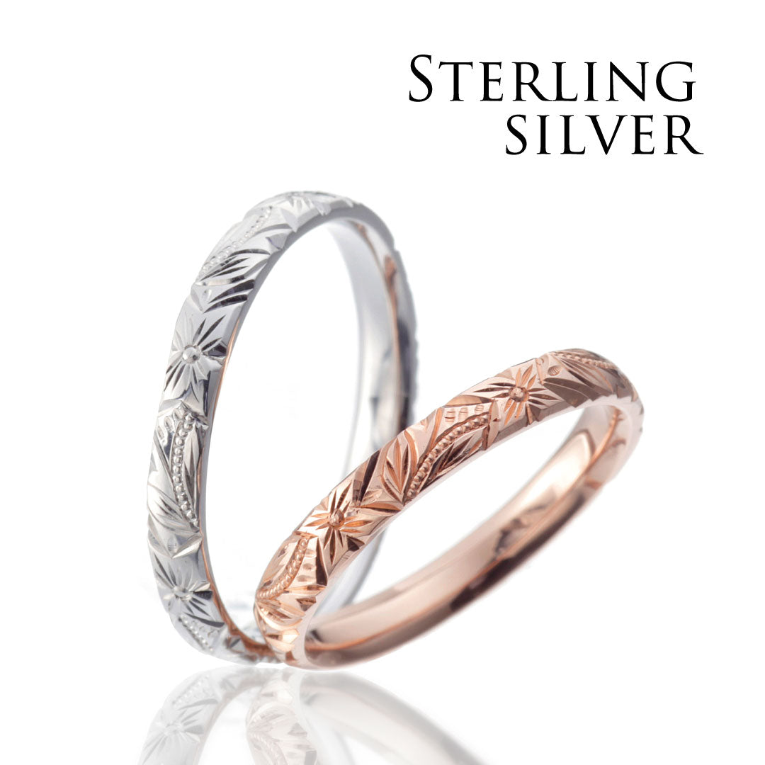 Hawaiian gold wedding band with MAULOA engraving finish.