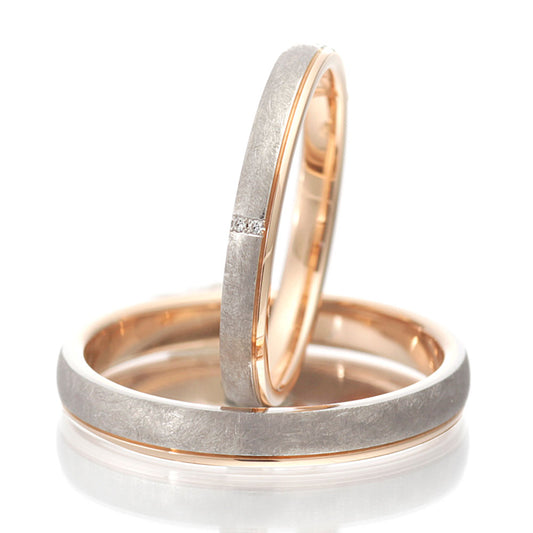 "Japanesestyle and unique wedding ring （wedding band,marriage ring）from the Aglobe japan's ennowa collection.
Combination marriage ring（wedding ring,wedding band） in platinum and K18 pink gold（K18 Yellow Gold）.
Combination wedding ring （wedding band,marriage ring） with Simple and natural texture.
Rings with surface treatment.
Ring made using traditional Japanese forging technique.
Close-up of hand-forged wedding ring （wedding band）.
"