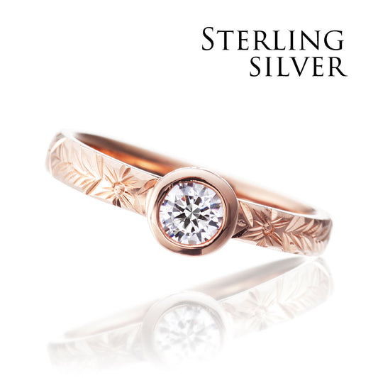 "AGLOBE JAPAN's HEART ISLAND bridal ring with lab-grown diamond in Straight design.
K18 pink gold（rose gold） engagement ring with Hawaiian and unique texture.
Hawaiian gold wedding band with OHANA engraving and vintage finish."