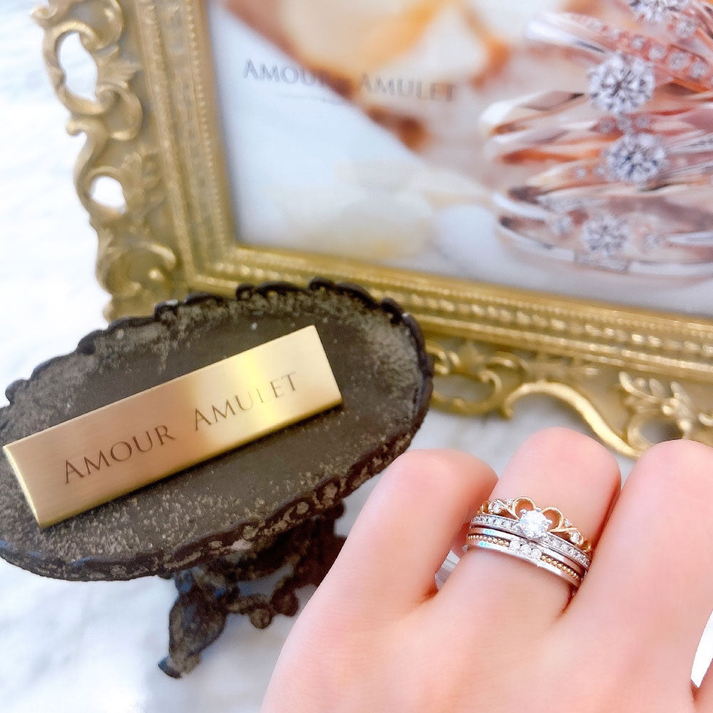 Wedding band （wedding ring）worn on hand in posed still image for styling display