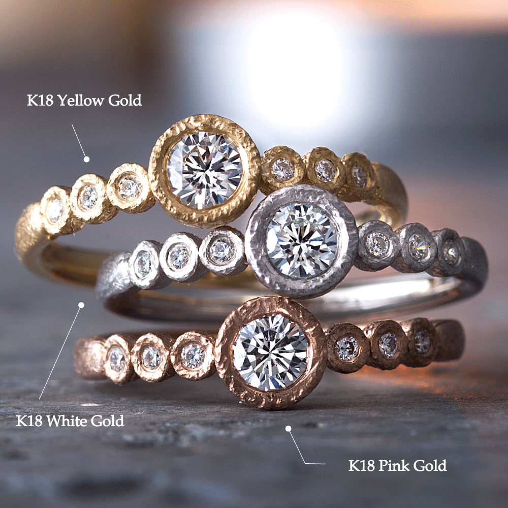 "AGLOBE JAPAN's neuspur bridal ring with lab-grown diamond in Straight design.
K18 White Gold , K18 pink gold（rose gold）and K18 Yellow Gold engagement ring with casual and unique texture.
Shape processing is applied to the ring surface.
"