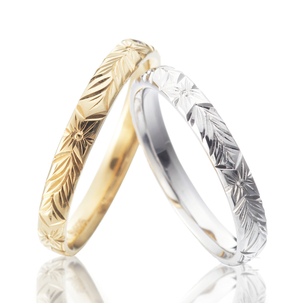 Hawaiian gold wedding band with OHANA engraving and vintage finish.