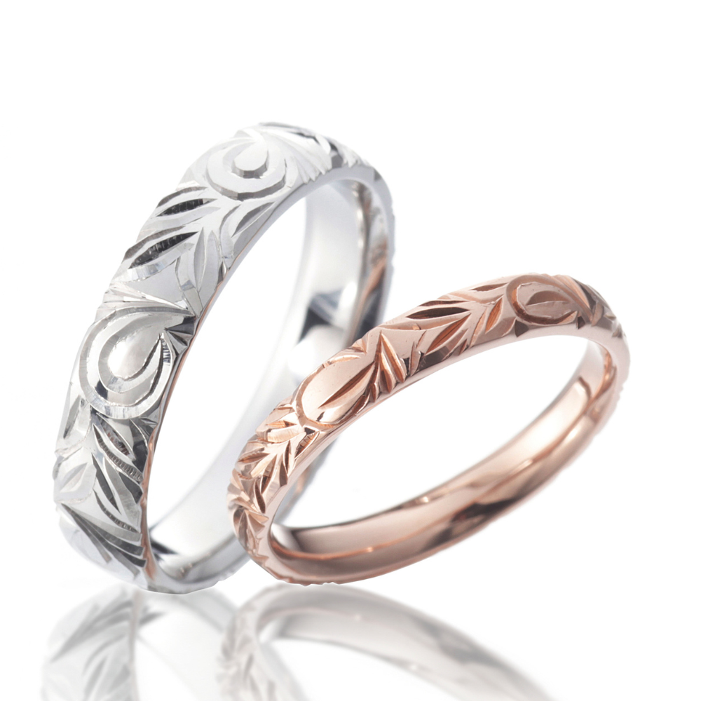 Hawaiian gold wedding band with  TOROPICAL_SCROLL engraving finish.