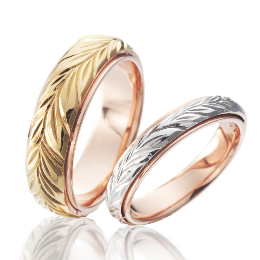 Hawaiian gold wedding band with MAILE LEI engraving finish.