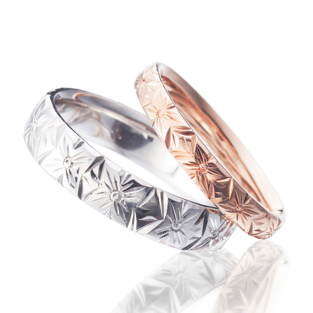 Hawaiian gold wedding band with PLUMERIA BOUQUET engraving finish.