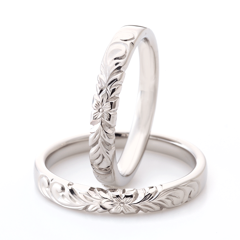 "casual and Hawaiian wedding ring （wedding band,marriage ring）from the Aglobe japan's mauoli collection.
K18 White Gold wedding ring （wedding band,marriage ring） with unique texture.
Hawaiian gold wedding band with LEI engraving and vintage finish."
