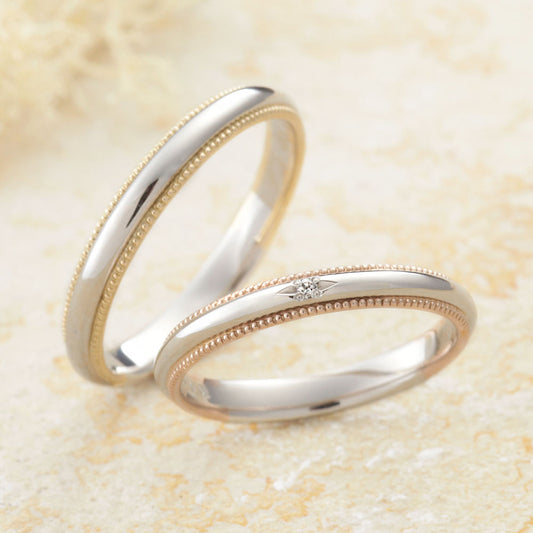 "antique wedding t ring from the Aglobe japan Amour Amulet collection.
Combination marriage ring（wedding ring,wedding band） in platinum and K18 pink gold（K18 Yellow Gold）.
Rings with milling"