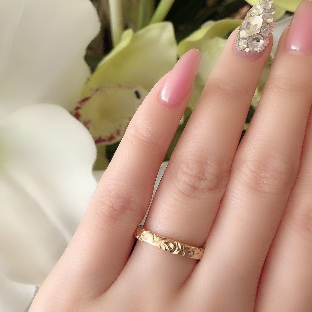 Wedding band （wedding ring）worn on hand in posed still image for styling display