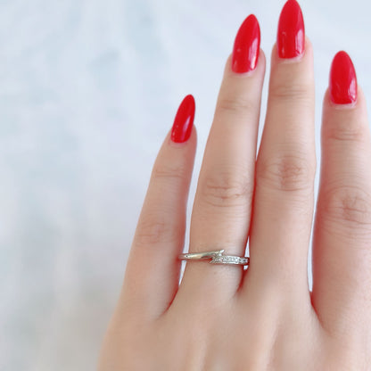 Wedding band （wedding ring）worn on hand in posed still image for styling display